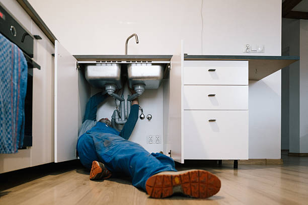 Professional Emergency Plumber technician working in Zanesville, OH
